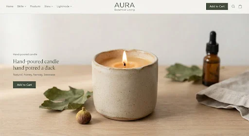 A hand-poured candle in a matte ceramic stoneware vessel with burning unbleached cotton wick, honey-toned beeswax wax surface, subtle green fig leaf accents, editorial warm interior glow.