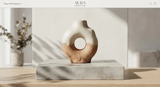 Modern sculptural ceramic vase with circular moon cutout in raw textured terracotta and chalk matte dip glaze, standing on a minimalist concrete plinth with subtle dramatic shadows.