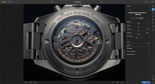 Exhibition sapphire caseback revealing the Swiss automatic Sellita SW500 movement with custom skeletonized tungsten rotor finished in dark ruthenium with gold lettering.
