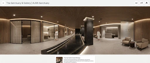 Wide panoramic virtual reality view of luxury subterranean architectural medical spa with reflections on dark stone water basin, timber acoustic panels, warm ambient spotlights, Swiss minimalist design, 360 degree spatial preview